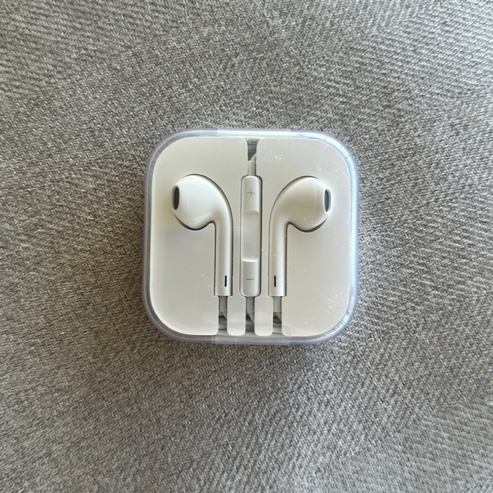 Brand new never opened Apple wired headphones with audio port jack